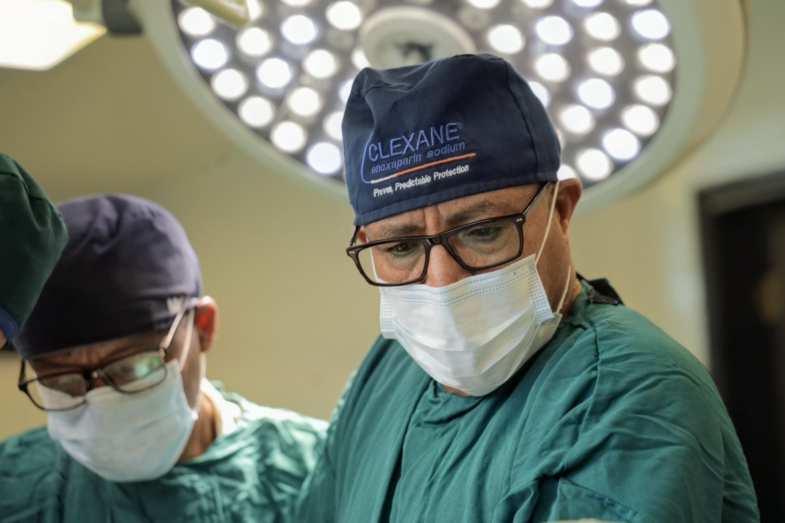 Dr. Worku Mekonnen operating under the theatre lights at Yordanos Hospital